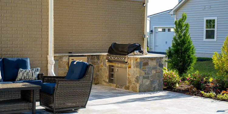 Natural Stone Veneer outdoor kitchen with built-in grill