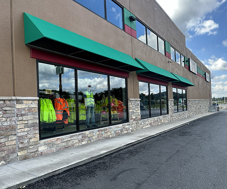 Natural Facing Cedarfield Ledgestone real stone veneer installed on a storefront