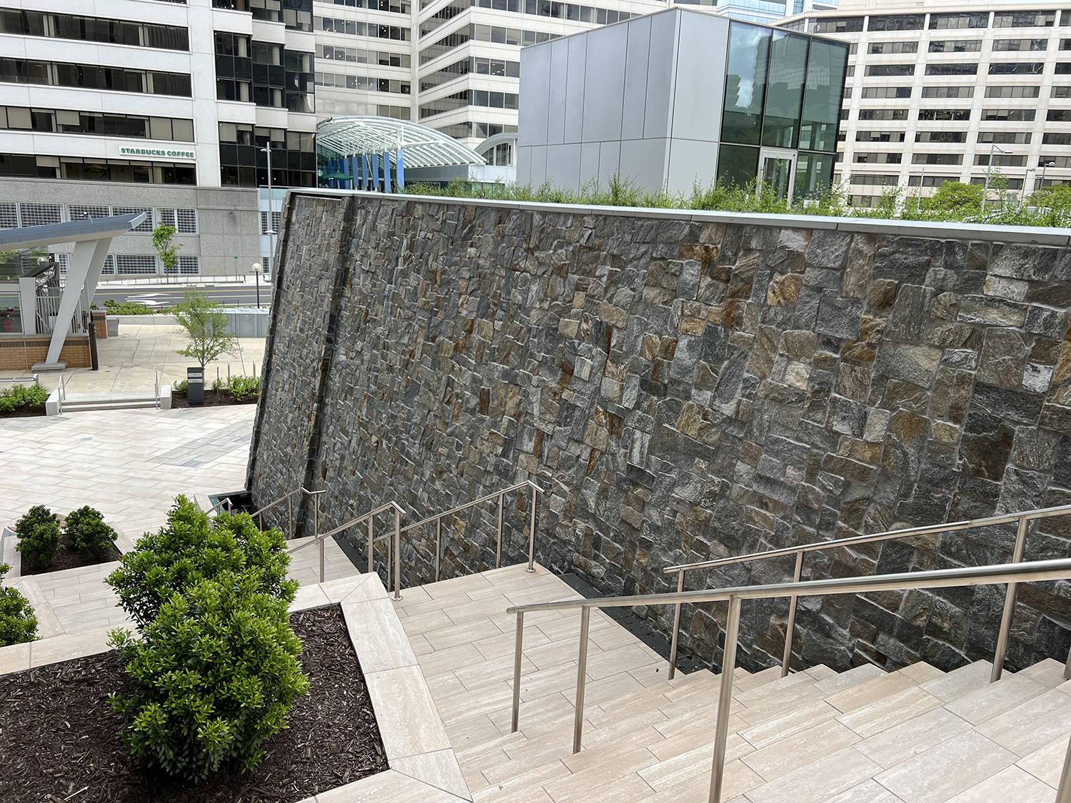 Chesapeake-Tysons-1 Real stone veneer waterwall along commercial staircase featuring Natural Facing Chesapeake Roughly Rectangular stone veneer
