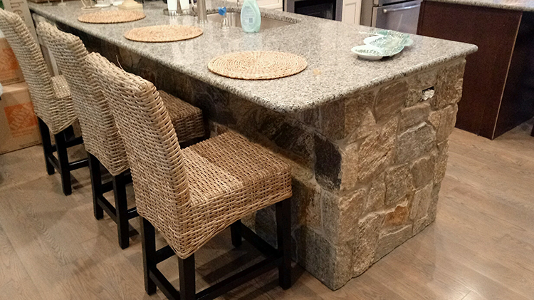 NF Ramone Brown Mosaic Interior Natural Facing Ramone Brown stone veneer installed on a kitchen island
