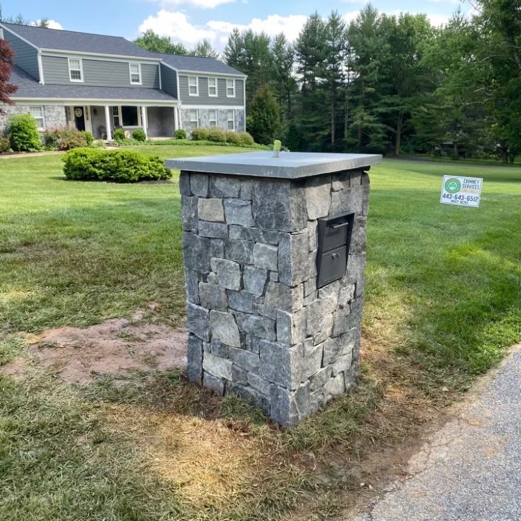 Ocean Blue Ledgestone natural stone veneer installed on a mailbox